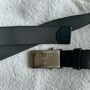 Authentic Prada Logo Engraved leather-trimmed canvas belt